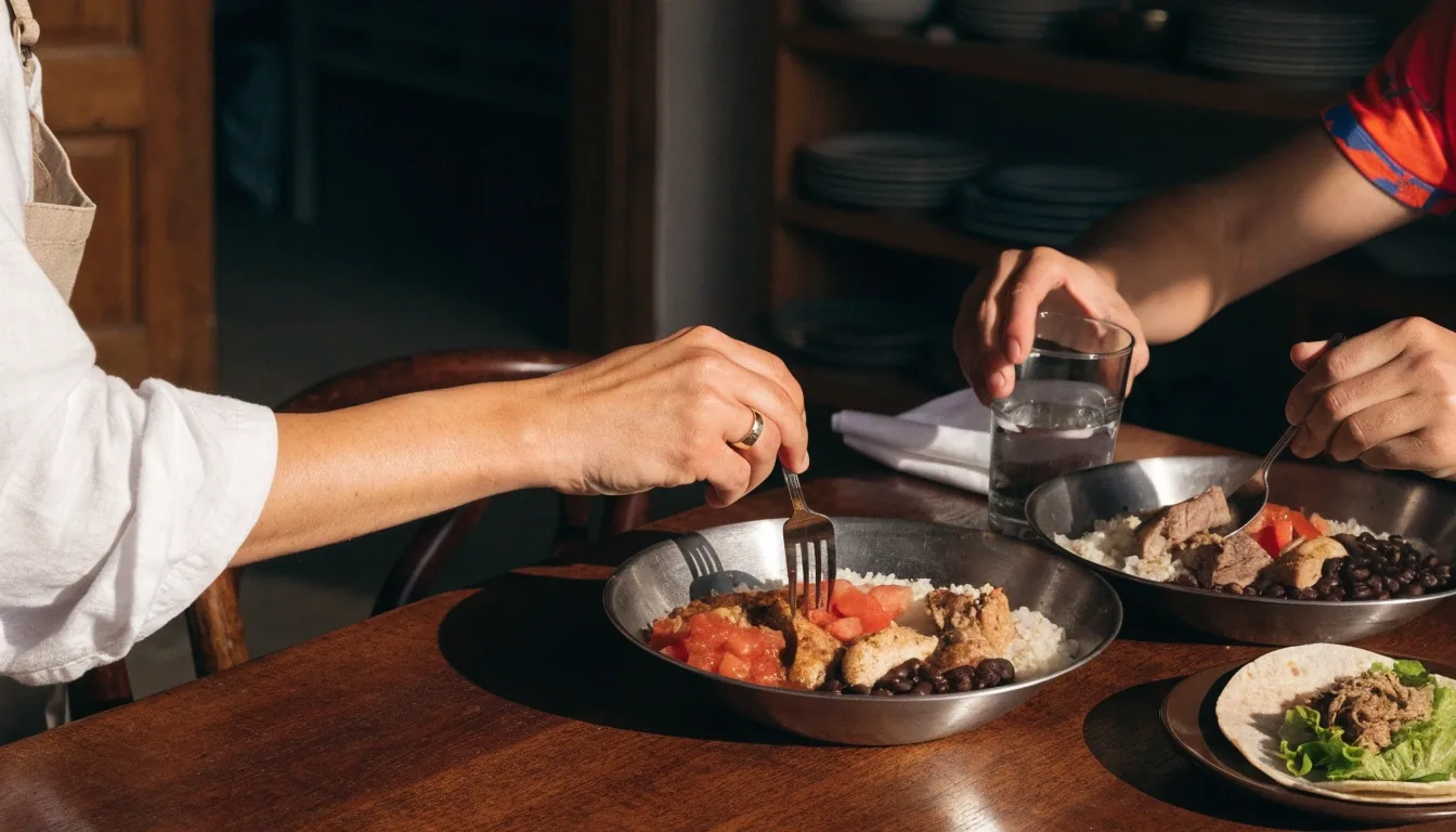 Bowls and tacos with chicken, beef, rice and salsa on a table